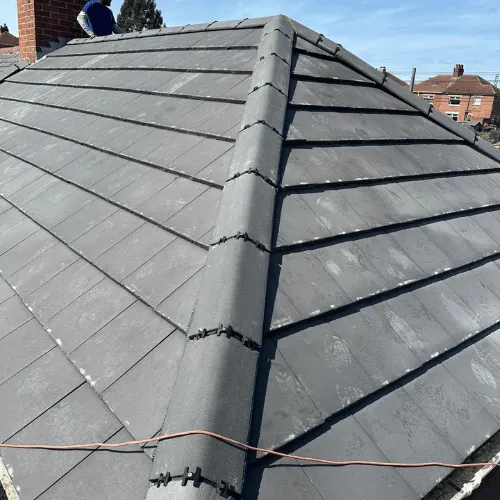 Chimney repair work being carried out from scaffolding
