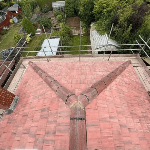 Aerial view of property with completed grey roof